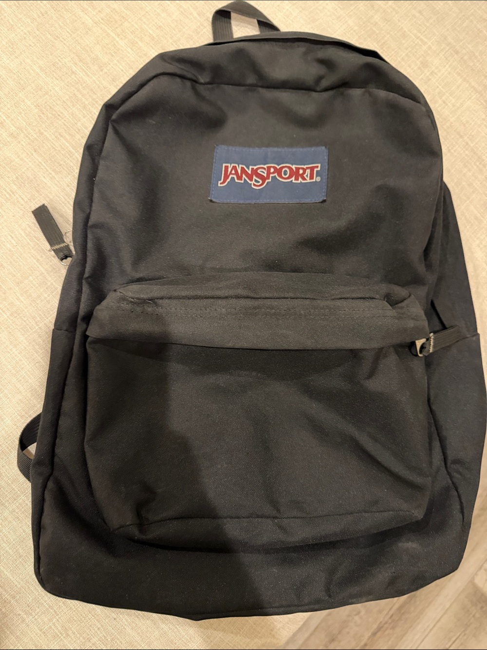 Jansport Black Backpack with Red Logo Patch